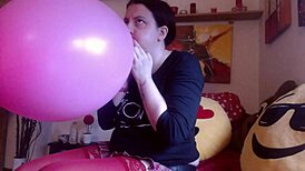 Italian milf climaxes hard on wet balloons during play