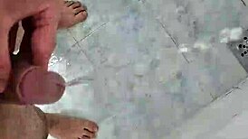 Twink pisses deliciously in the shower