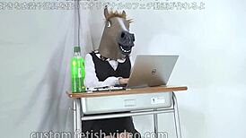 A Female Office Worker Wears a Mask at Work