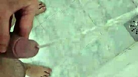 Twink pisses deliciously in the shower