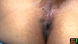 Black tranny strokes cock