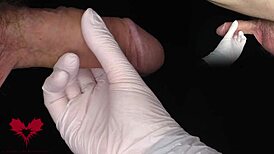 Mistress in White Latex Gloves Commands Ejaculation into Tomax Venus Real Onahole