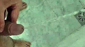 Twink pisses deliciously in the shower