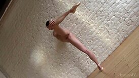lovely ballerina annett a strips for classic nude ballet in studio. her moves captivate everyone.