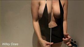 Wifey casually cleans with her shirt down, showing off.