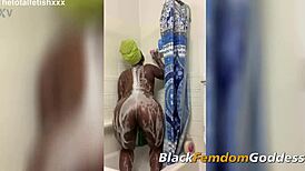 ebony goddess claps booty and plays with toys in shower