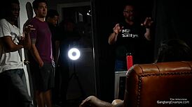 Busty milf interacts with five strangers simultaneously