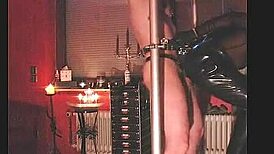 Rubbernurse Agnes Delivers Brutal Spanking and Severe Caning to Slave