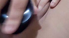 Milf enjoys solo masturbation with black dildo