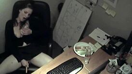 secretary at work rubbing her tits and fingering her pussy to orgasm