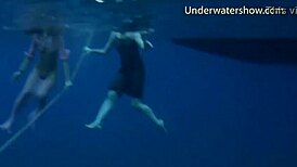 Are These Hot Teens In Bikinis Bathing Underwater In Tenerife Sea?