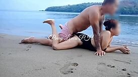 amateur couple gets naughty with public sex on sunny beach