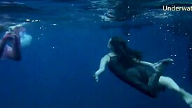 Are These Hot Teens In Bikinis Bathing Underwater In Tenerife Sea?