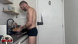 Is gustavo sucking her boyfriend in the kitchen?