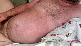 A Man Moans During Backhand Masturbation, Reaching Orgasm With Huge Cock