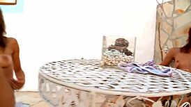 Maria and Natasha finger each other.