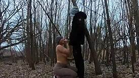 topless thick girl sucks cock in public park