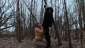 topless thick girl sucks cock in public park