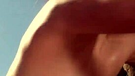 Gianna Michaels' big tits get titty fucked outdoors