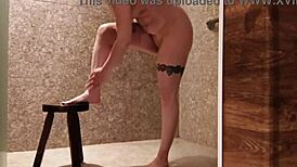 Hidden camera catches Latina client masturbating in hotel shower.