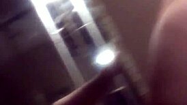 Intense squirting in the mirror with big tits