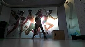 Cute Blonde Teen Warms Up at Gym, Stretching Seductively.