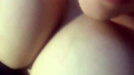 Intense squirting in the mirror with big tits