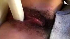 Wow, check this Japanese girl rubbing her hairy pussy up close 'til she squirts!