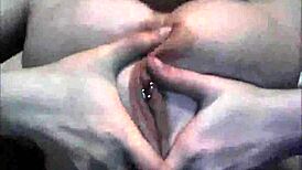 She's playing with her big boobs on webcam!