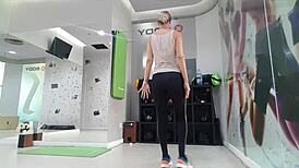 Cute Blonde Teen Warms Up at Gym, Stretching Seductively.