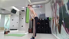 Cute Blonde Teen Warms Up at Gym, Stretching Seductively.