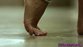 Babe says, 'Watch my footjob tug your cumshot'