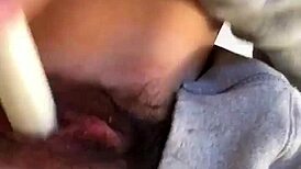 Wow, check this Japanese girl rubbing her hairy pussy up close 'til she squirts!