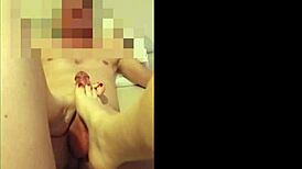 Sexy milf feels pleasure giving footjob to cock