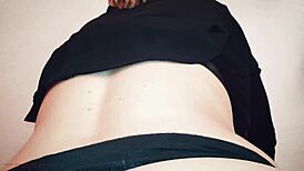 young stepmom enjoys a private moment with her stepson in the bedroom