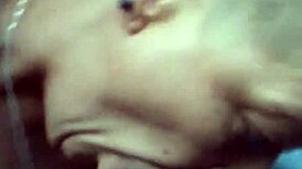 Boldly swallow two hot nuts in your mouth eagerly.