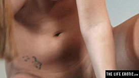 Gorgeous girl bounces her tight shaved pussy on huge dildo