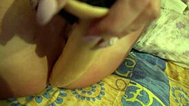 Hot milf housewife in handcuffs orgasms while fucking her pussy with oiled dildo
