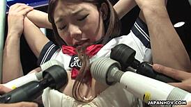 Japanese teen Aoi Yuki with big tits enjoys shaved pussy fingering in group sex.