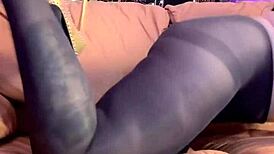 She masturbates in black pantyhose, reaching orgasm while wearing heels and leggings.