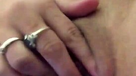 Using vibrator on her dry pussy lips, teasing those sexy folds with intense toy play.