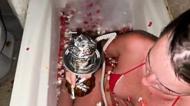 Intense bath scene with rose petals