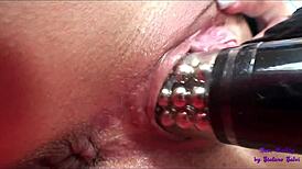 Two Brunettes Touch and Lick on Orange Sofa