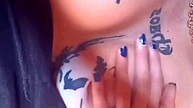 Woman with huge pussy lips shows off hairy goth tits and masturbates