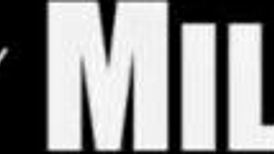 Redhead Lauren Phillips in handcuffs gives Miles Long handjob and blowjob.