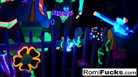 romi rain and dani daniels get into some lesbian black-light fun with big tits and ass