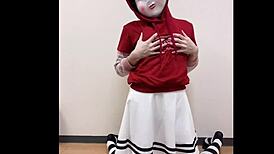 Girl In Skirt Teases With Hidden Pleasures