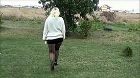 Why does this nylon big ass woman tease outdoors?