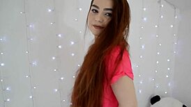 redhead babe touches herself in the bathroom