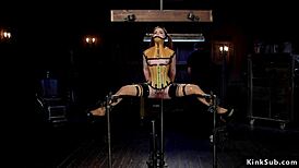 Submissive Brunette Chokes In Plastic Corset Bondage